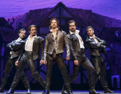 Christian Borle as Shakespeare with his groupies.  Photo by Joan Marcus